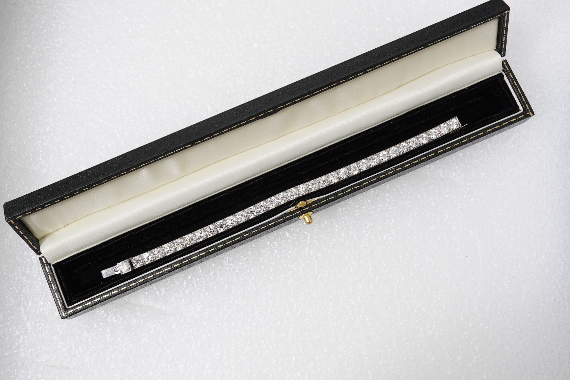 An Art Deco diamond tennis bracelet, circa 1930